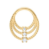 Anillo de piercing dorado con tres filas retorcidas y cristales claros