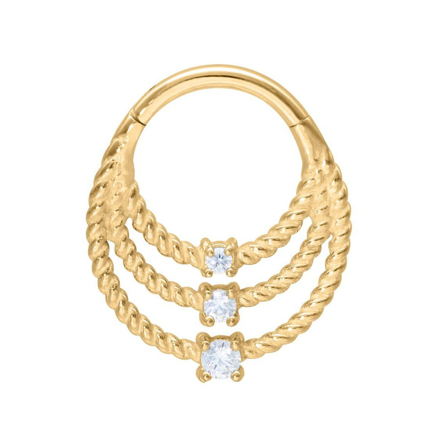 Anillo de piercing dorado con tres filas retorcidas y cristales claros