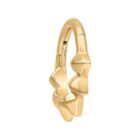 Aro de piercing dorado con diseño de espigas de acero quirúrgico sobre fondo blanco