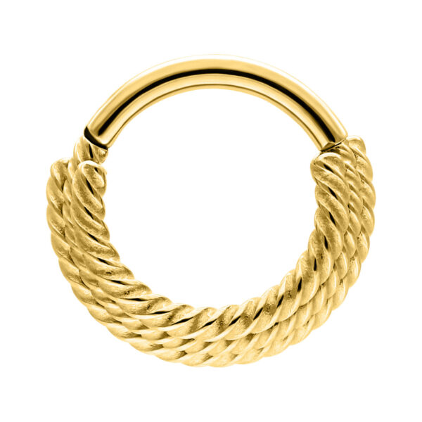 Clicker de septum dorado con tres cuerdas torcidas sobre fondo blanco
