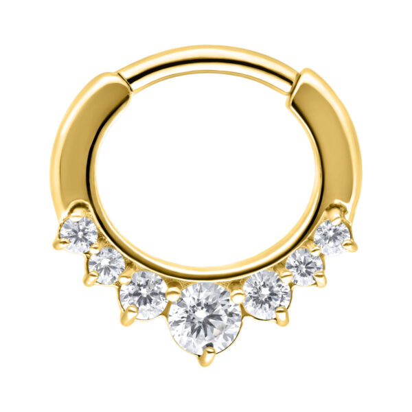 Clicker de septum dorado con cinco cristales claros sobre fondo blanco
