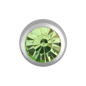 Accesorio de piercing redondo plateado con cristal verde claro sobre fondo blanco