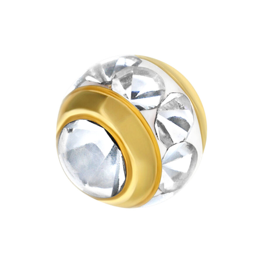Accesorio de piercing dorado con cristales claros sobre fondo blanco