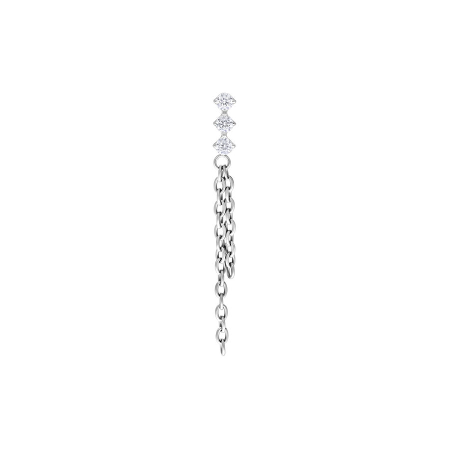 Accesorio de piercing plateado con tres cristales claros y cadenas colgantes sobre fondo blanco