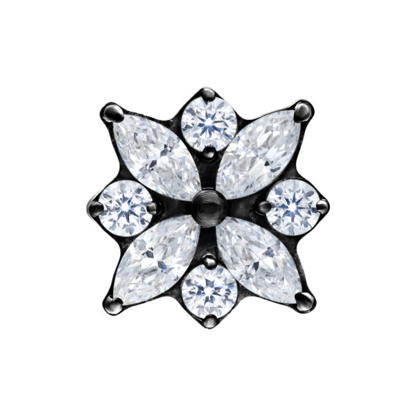 Adorno de flor de cristal negro con cristales claros sobre fondo blanco