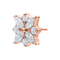 Ajuste Push de Roségold con Cristal en Forma de Flor Ajuste de roségold con piedras cristalinas en forma de flor sobre fondo blanco