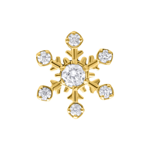 Accesorio floral dorado para piercing con cristales brillantes sobre fondo blanco