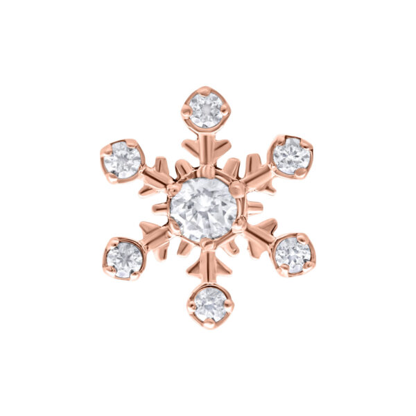 Top de copo de nieve en oro rosa con cristales claros sobre fondo blanco