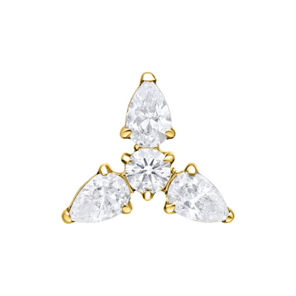 Accesorio Trinity de oro con tres piedras cristalinas sobre fondo blanco