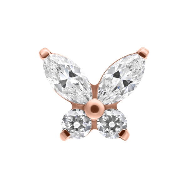 Accesorio de mariposa en oro rosa con cristales claros sobre fondo blanco