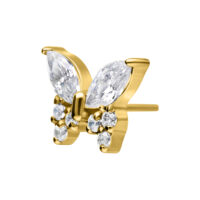 Aplique de mariposa dorado con cristales claros sobre fondo blanco