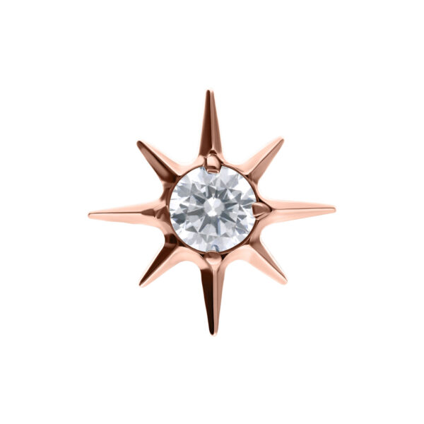 Estrella de oro rosado con cristal claro sobre fondo blanco