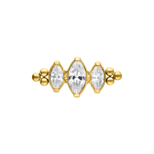 Accesorio Push Fit dorado con tres cristales claros sobre fondo blanco