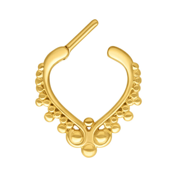Clicker de septum dorado con adorno de bolas sobre fondo blanco