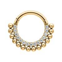 Clicker de Cristal Dorado Little Balls con Cristales Anillo de piercing dorado con cristales sobre fondo blanco