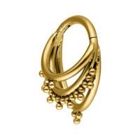 Anillo de piercing Triple Oriental Clicker dorado sobre fondo blanco