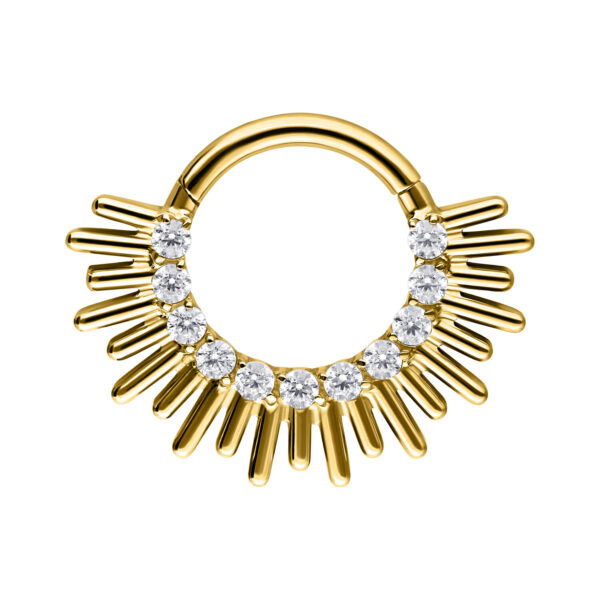 Clicker de Septum dorado con cristales en forma de rayos sobre fondo blanco