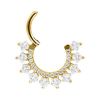 Clicker de septum dorado con cristales brillantes sobre fondo blanco