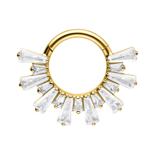 Clicker de septum dorado con cristales brillantes sobre fondo blanco