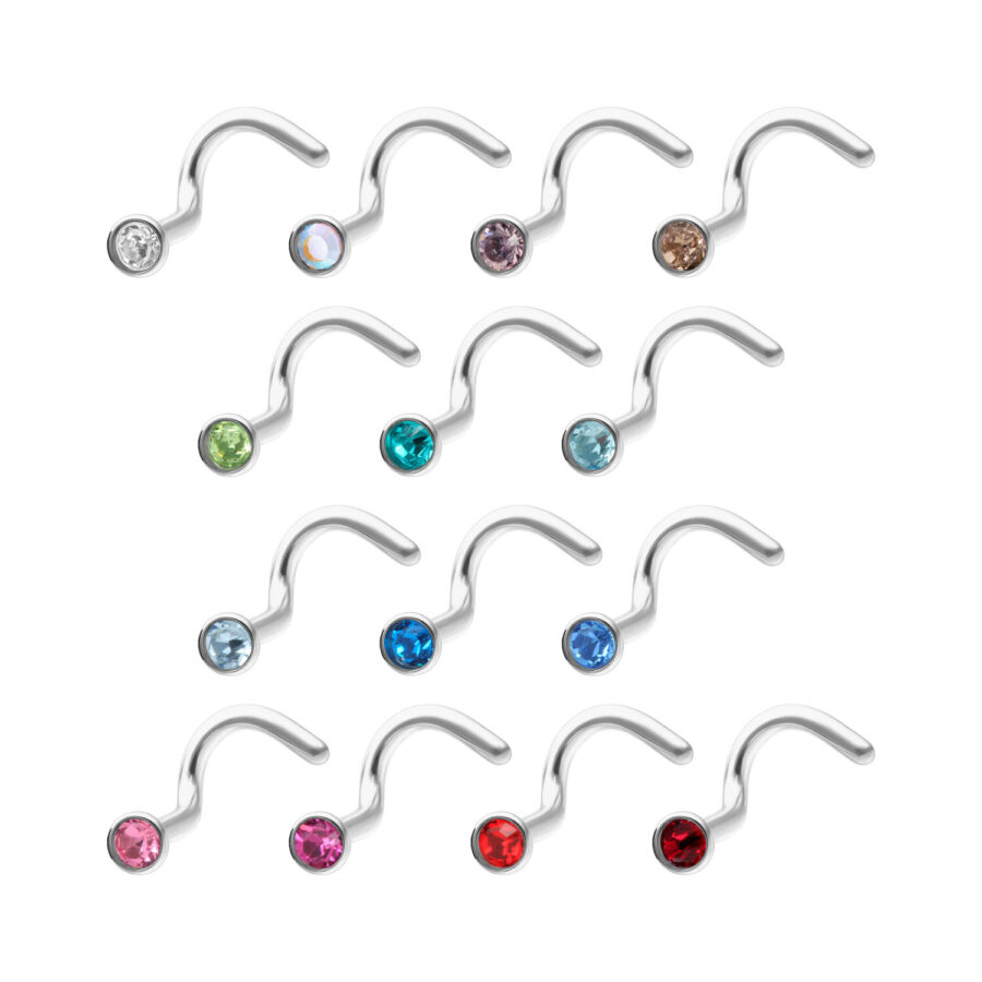 Varios nasenstecker de titan con cristales de colores sobre fondo blanco