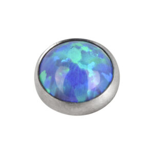 Aplique redondo de opalo azul navy para piercings sobre fondo blanco