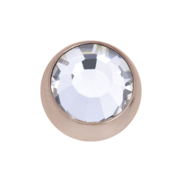 Accesorio redondo de piercing de acero quirúrgico rosado con cristal claro sobre fondo blanco