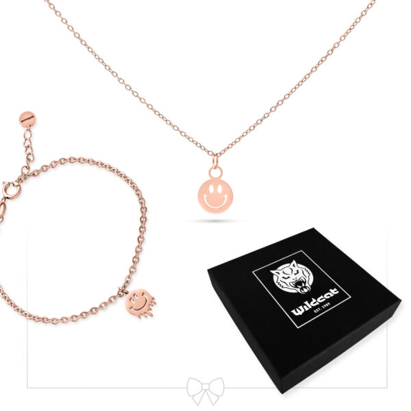 Conjunto de joyas en oro rosa con colgante de sonrisa y caja de regalo negra