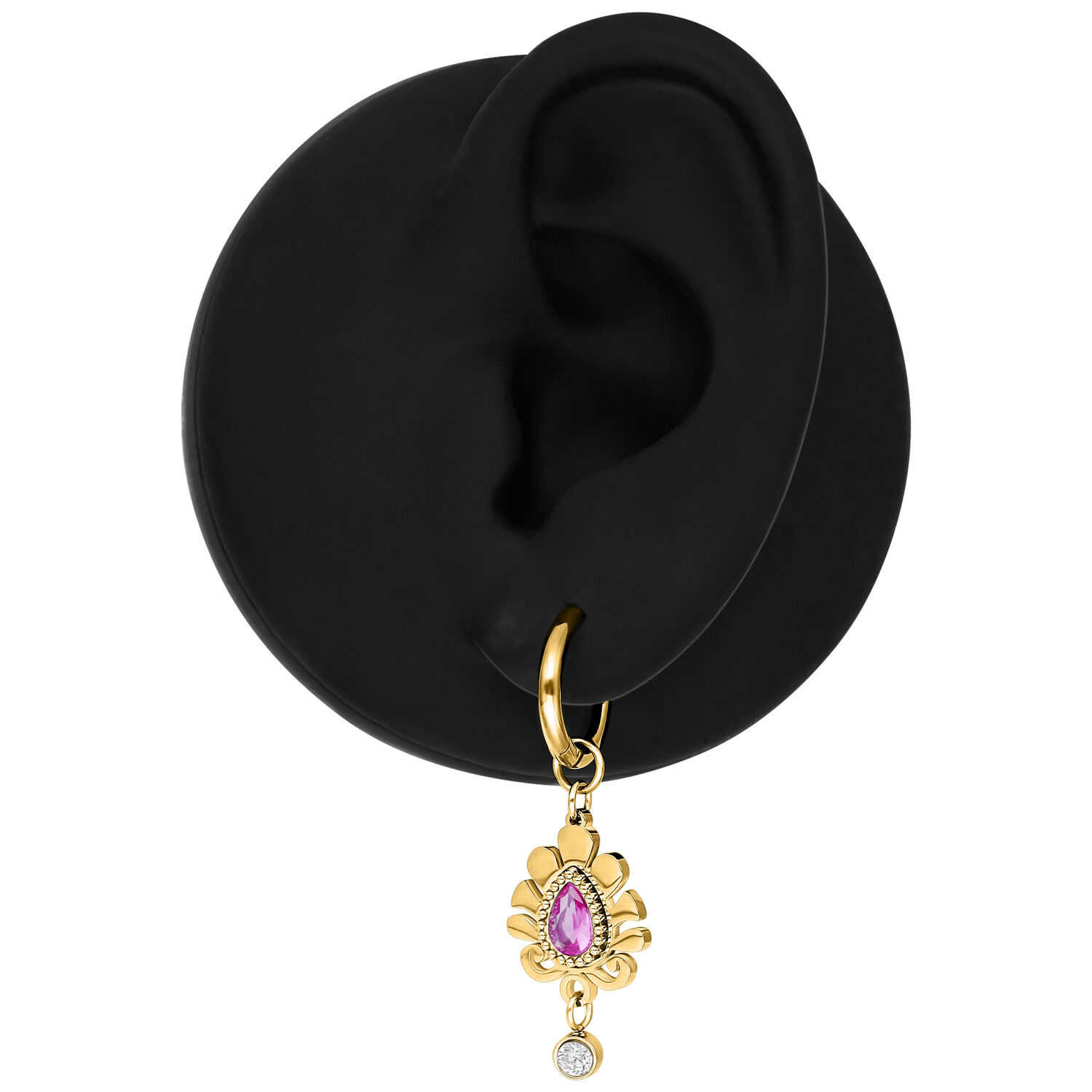 Pendiente dorado con cristal rosa Pendiente dorado con cristal rosa en un modelo de oreja negra