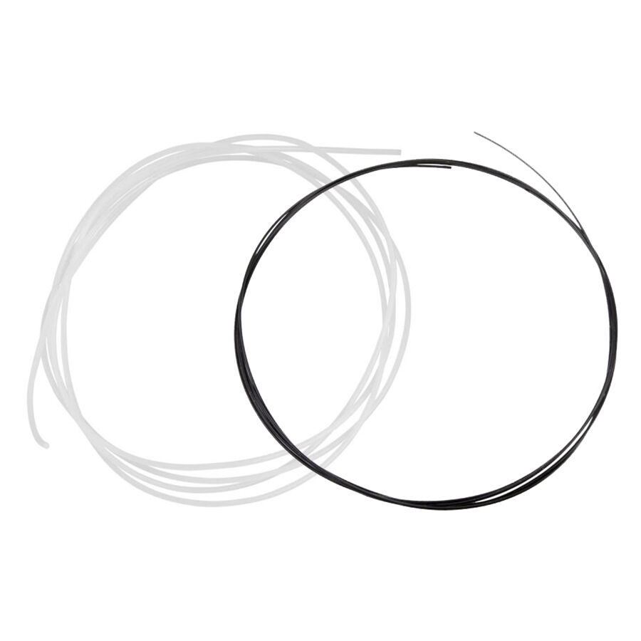 Barra de piercing PTFE negra y transparente sobre fondo blanco