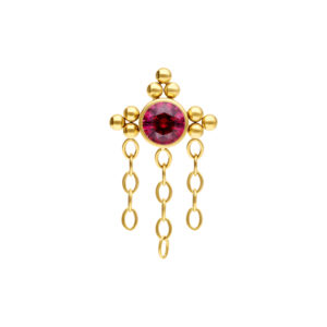 Accesorio de piercing dorado con cristal rojo y cadenas sobre fondo blanco