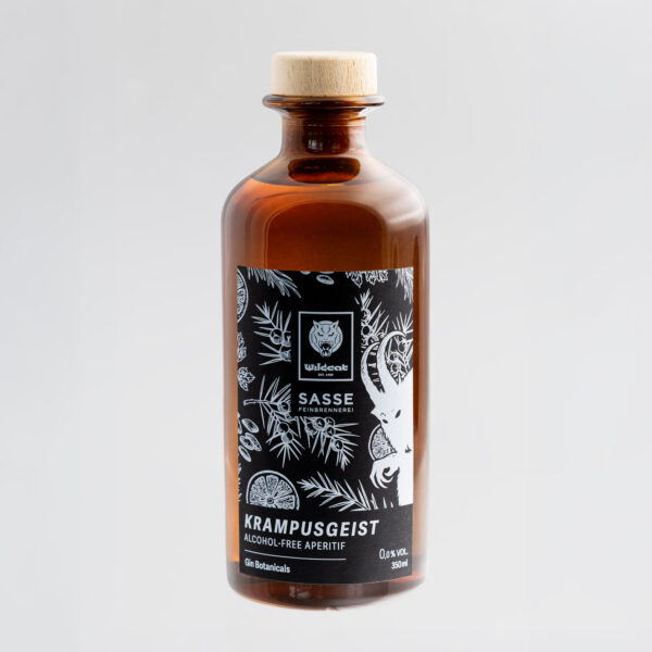 Botella de vidrio marrón con etiqueta negra, motivos botánicos, fondo gris