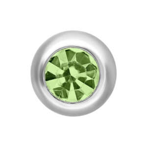 Pieza de cristal verde claro con montura plateada sobre fondo blanco