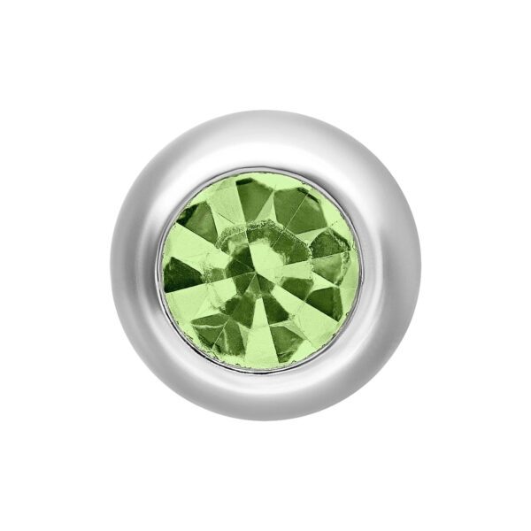 Pieza de cristal verde claro con montura plateada sobre fondo blanco