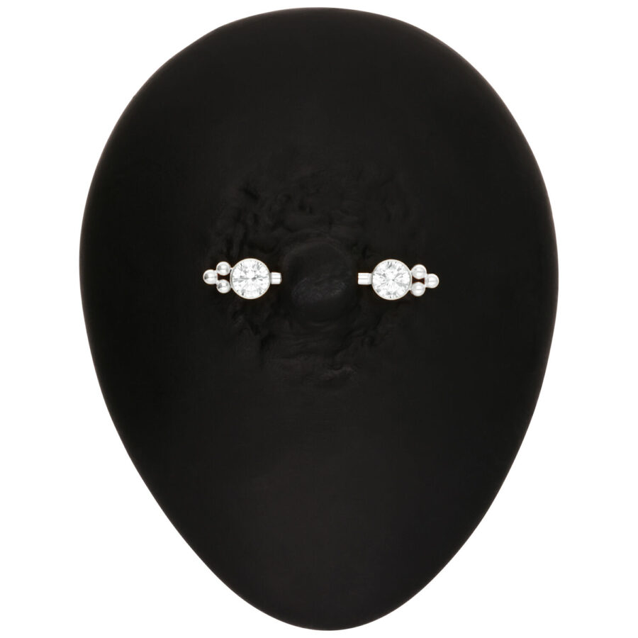 Barbell de oro blanco con piedras claras sobre fondo negro