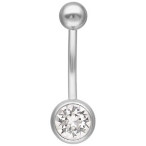 Piercing de ombligo plateado con cristal claro sobre fondo blanco