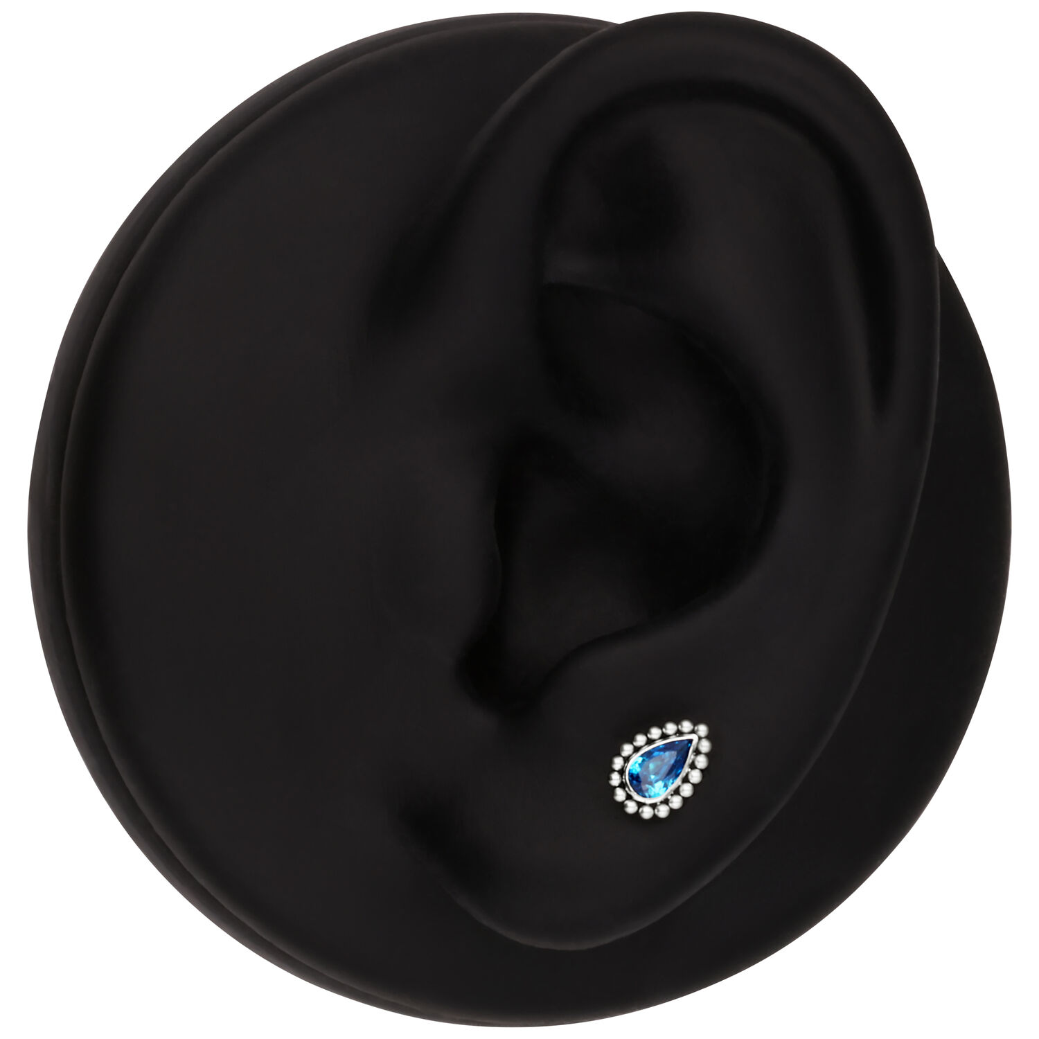 Cristal Turquesa para Push Fit Exhibidor negro de oreja con un cristal turquesa en forma de gota