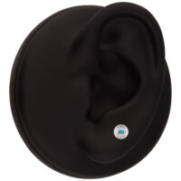 Aplique de oro blanco con cristal turquesa Aplique de oro blanco con cristal turquesa en un modelo de oreja negra