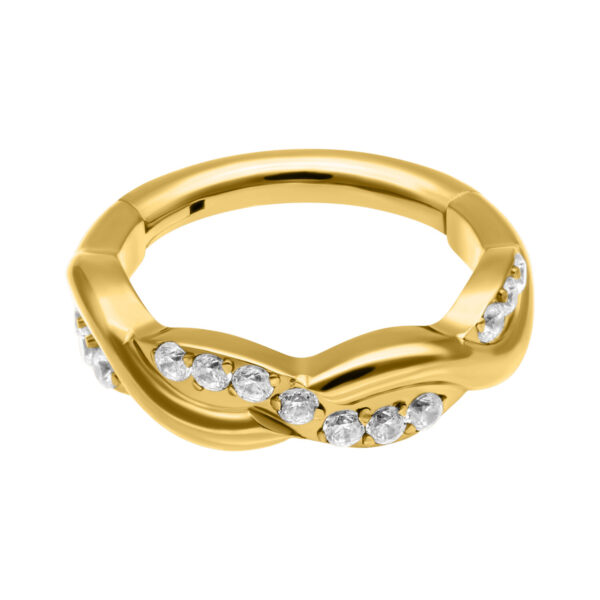 Anillo de piercing dorado con cristales claros, diseño ondulado sobre fondo blanco