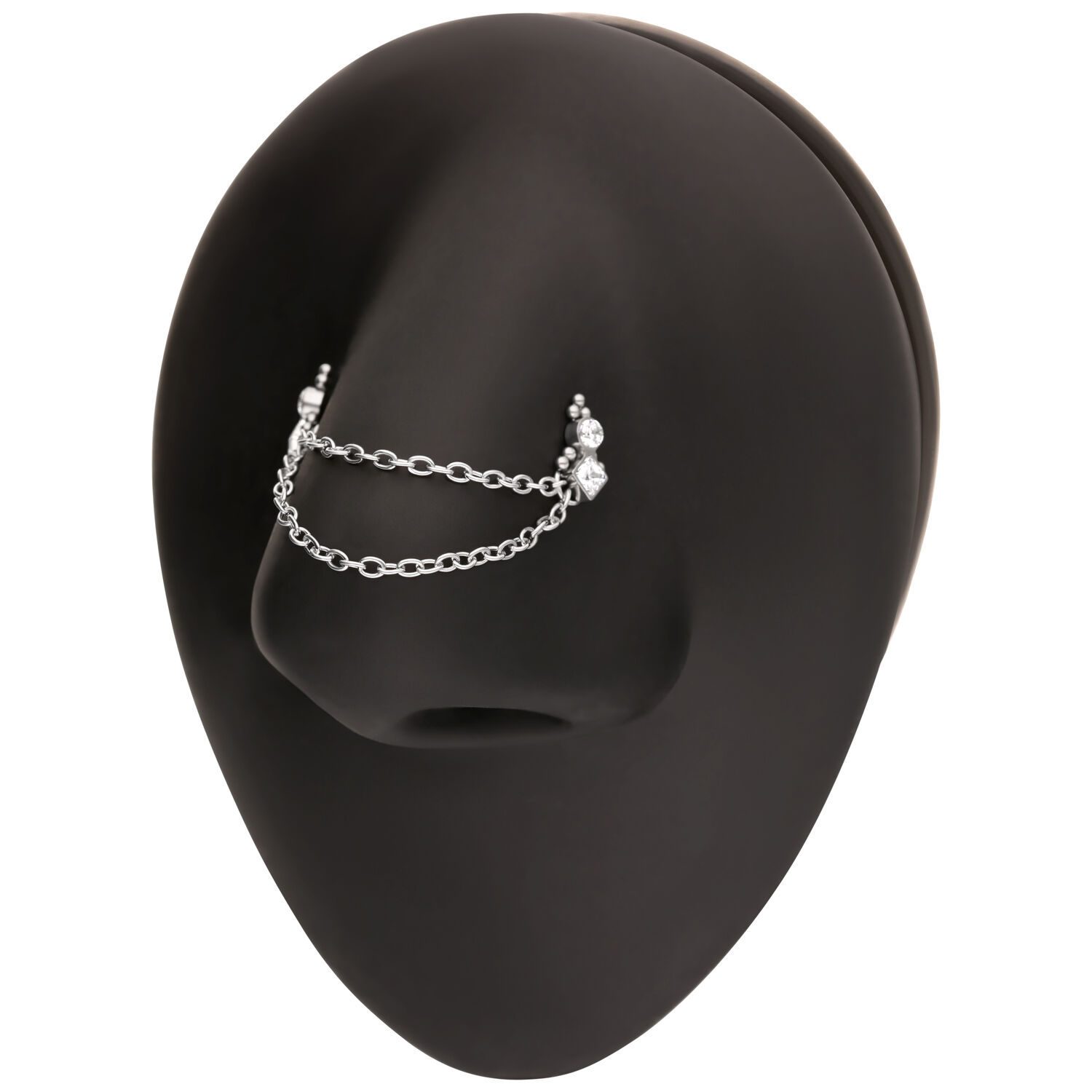 Cadena de piercing plateada para la nariz Cadena de piercing plateada con bolas en un soporte negro