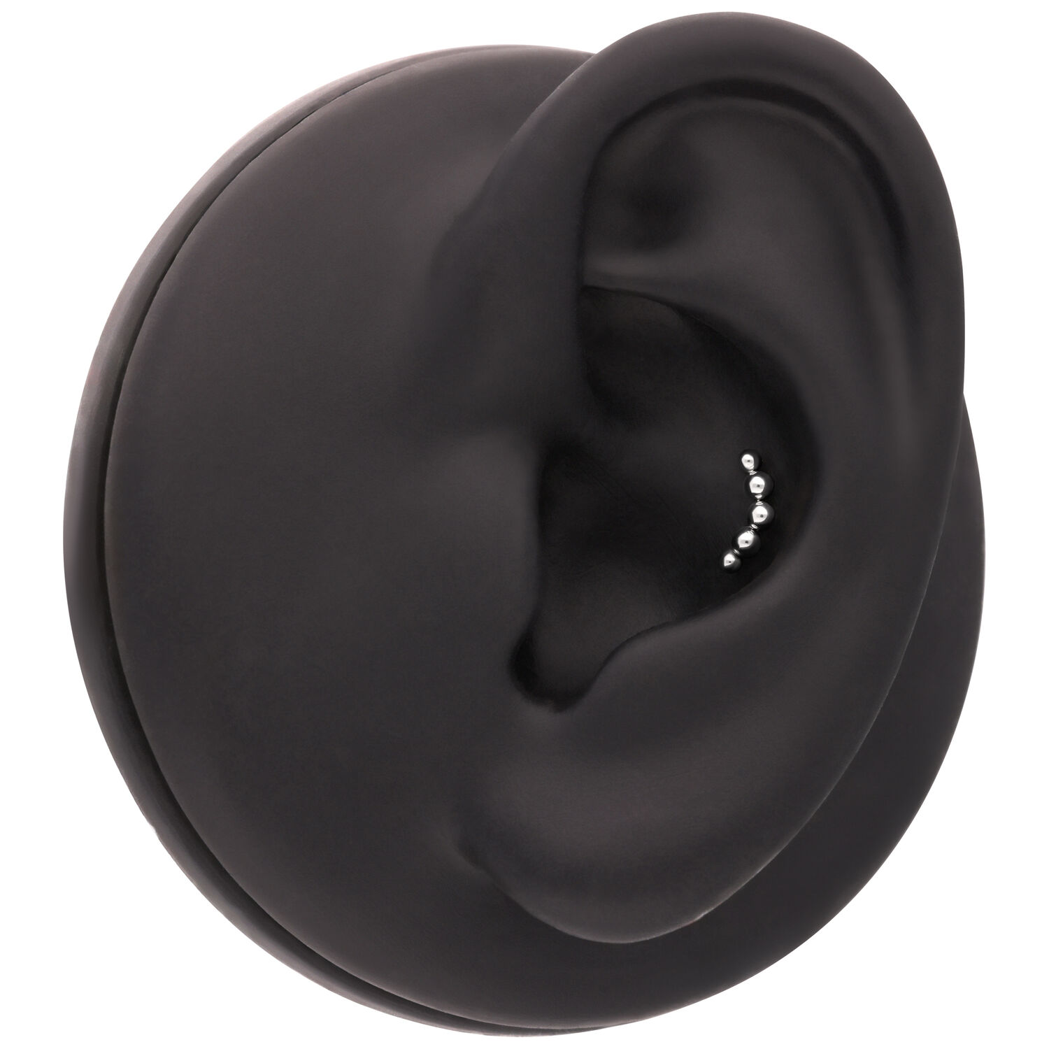 Accesorio negro para piercing de oreja con bolas Accesorio negro para piercing de oreja con pequeñas bolas plateadas sobre fondo negro
