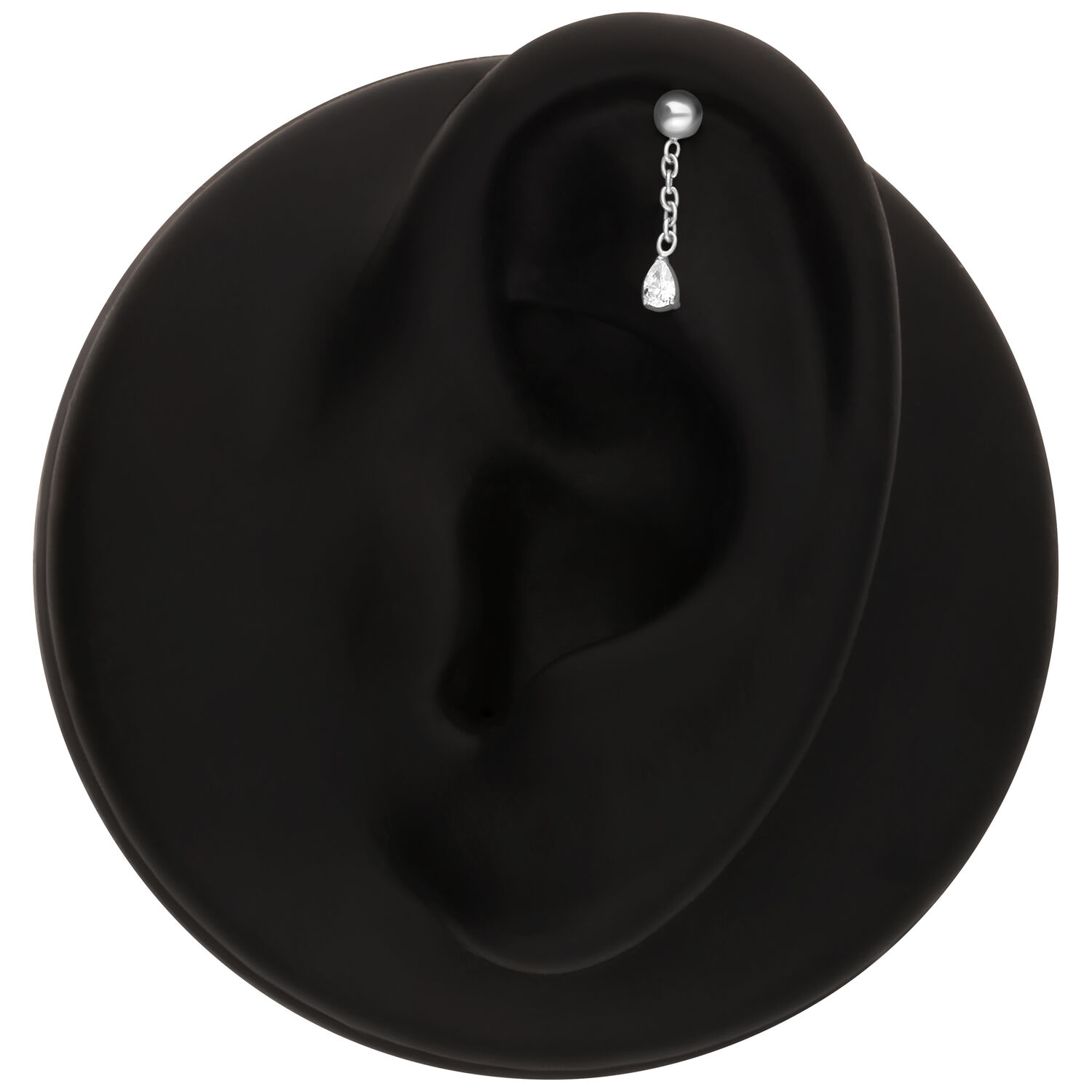 Aplique Rook plateado con cristal Aplique de piercing plateado con un cristal claro en un modelo de oreja negra